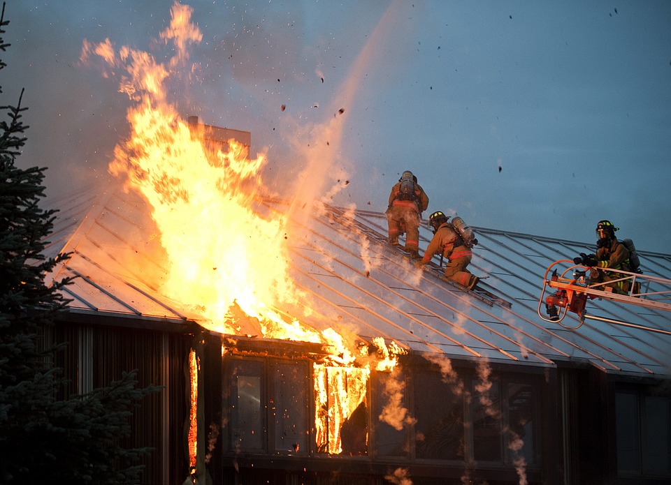 Firefighters on roof